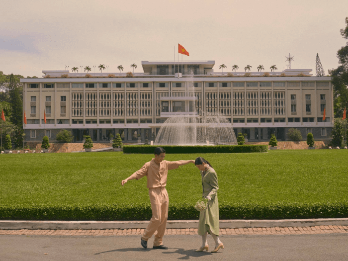 Vintage style pre-wedding photo by Bela Studio with Independence Palace background. - Facebook