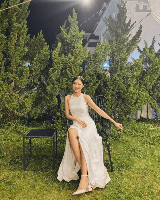 Olivia Ng Bridal's custom satin wedding dress. - Facebook