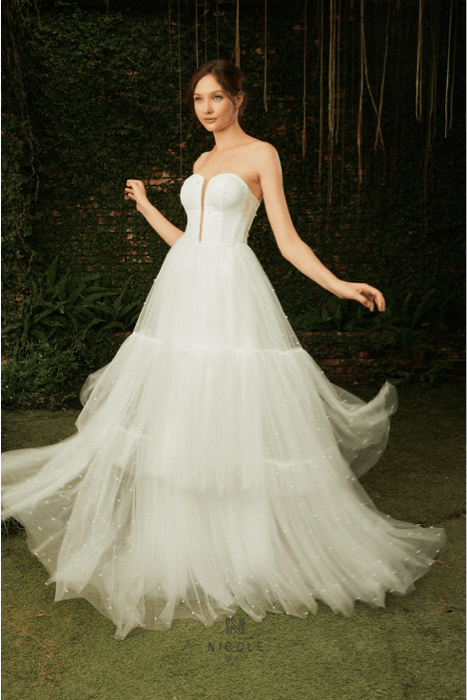 Twilly layered dress with delicate style from Nicole Bridal - Facebook