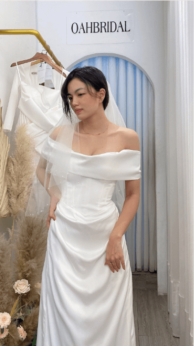 Elegant satin wedding dress from O A H Bridal - Facebook