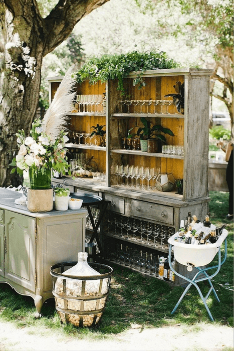 A fancy drink stand is an integral part of any outdoor wedding. - Pinterest