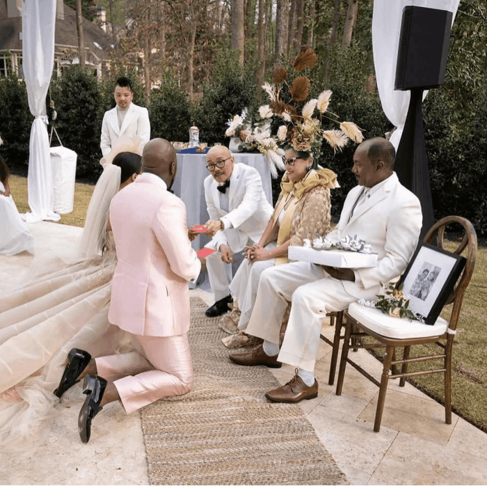 Jeannie Mai’s family was giving the groom and bride lucky money, which is a Vietnamese wedding tradition to bring luck to the married couple.  - Facebook